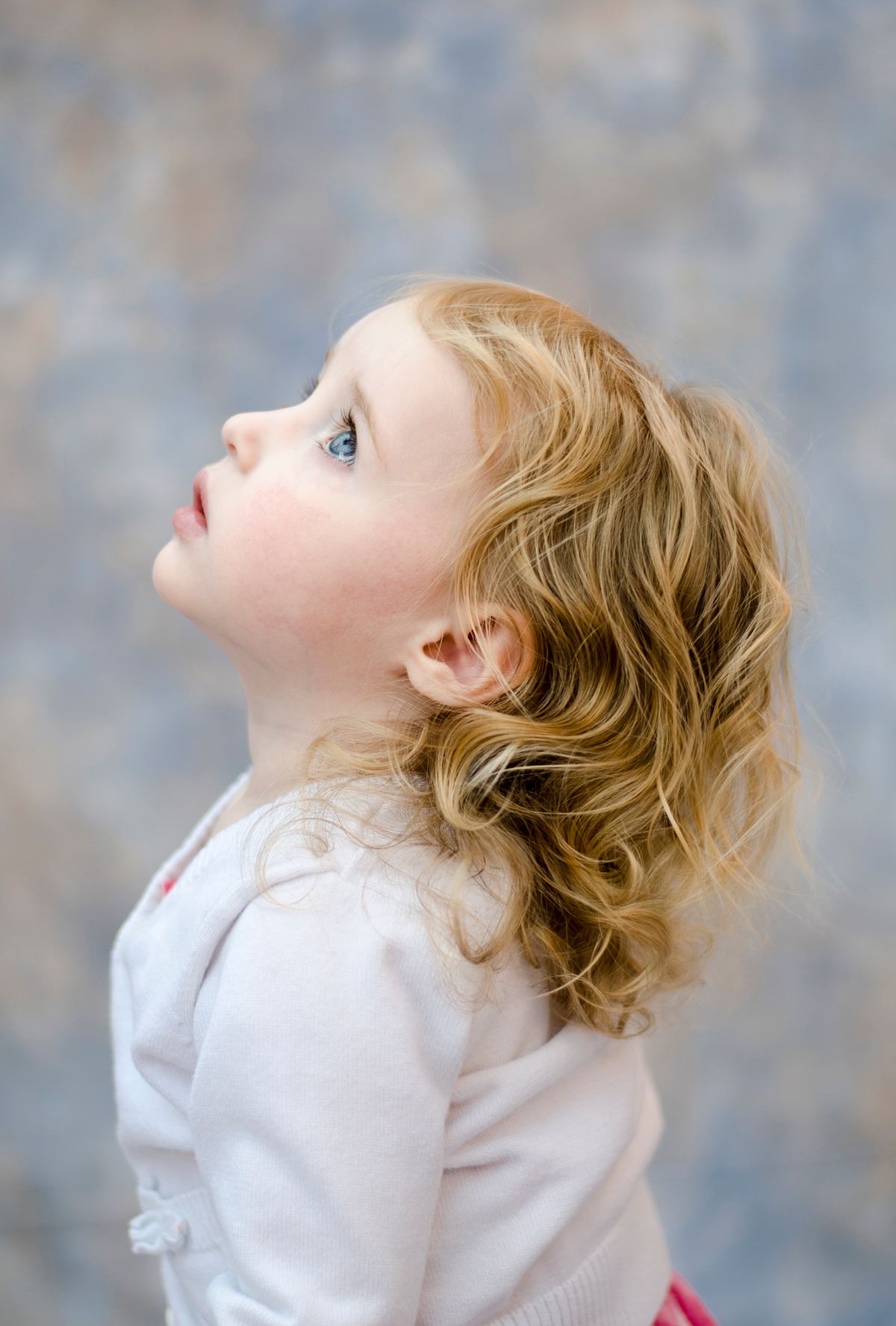 A child look up towards her mother, a moment of clarity and admiration.